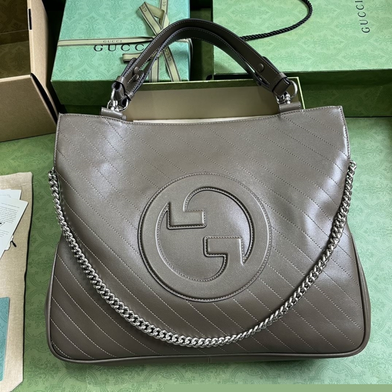 G*u*i top handle bags